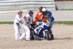 Aaron Yates gets help from the corner workers